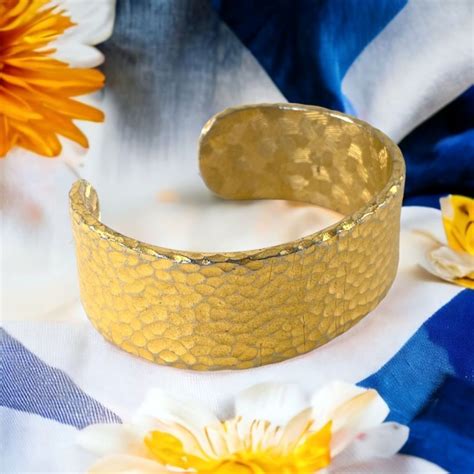 vintage givenchy gold tone textured bangle hinged bracelet|Givenchy gold earrings vintage.